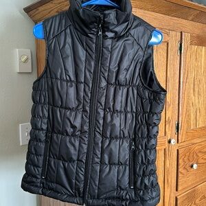 Black puffer vest size medium